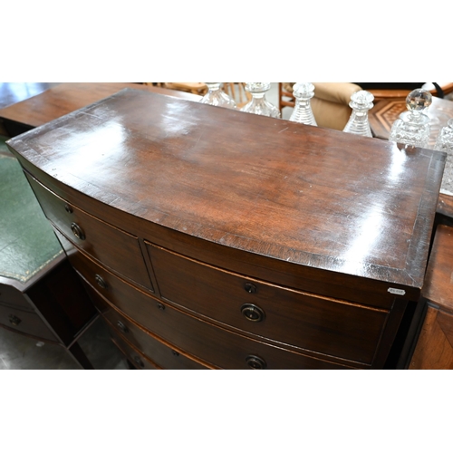 70 - A 19th century mahogany bowfront chest of two short over three long drawers raised on splayed bracke... 