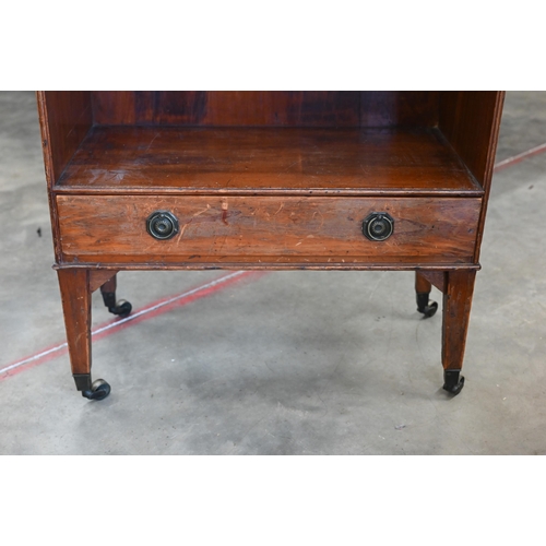 71 - An antique waterfall bookcase with single drawer raised on square tapering supports with brass caste... 