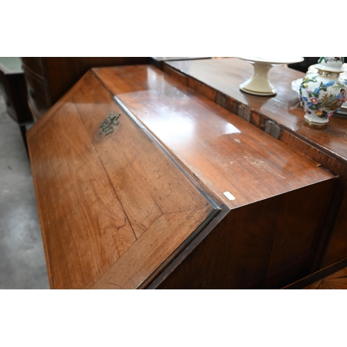 73 - A George III mahogany fall-front bureau with fitted interior featuring a secret three drawer compart... 