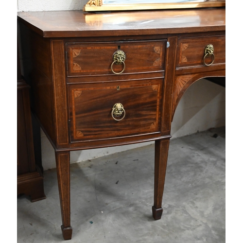 75 - An Edwardian inlaid mahogany Sheraton revival bowfront sideboard with cupboard and drawers with bras... 