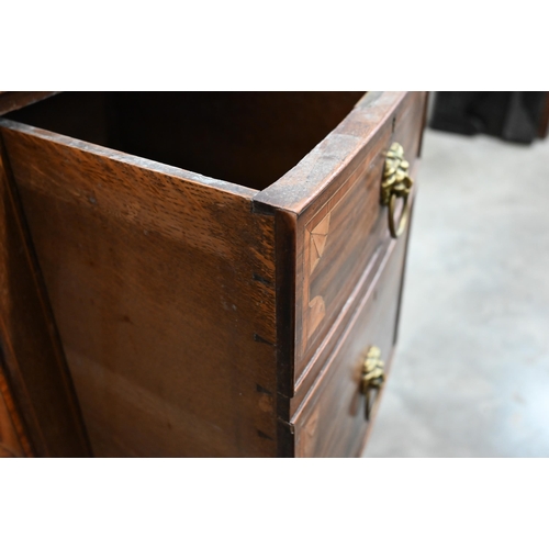 75 - An Edwardian inlaid mahogany Sheraton revival bowfront sideboard with cupboard and drawers with bras... 