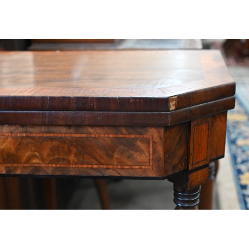 77 - A Georgian walnut and satinwood crossbanded card table with canted folding baize lined top, raised o... 