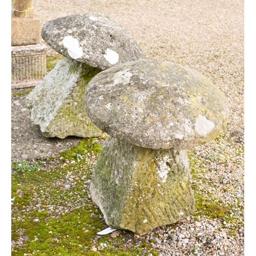 8 - A companion pair of antique hand cut granite staddle stones and caps (2)