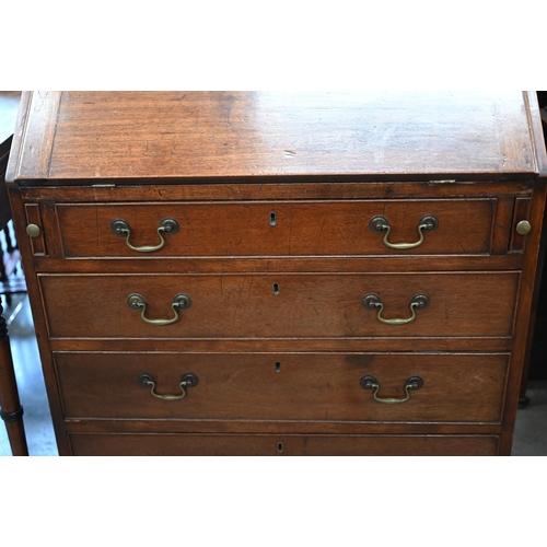 80 - A 19th century mahogany fall-front bureau with fitted interior over four long graduating drawers rai... 