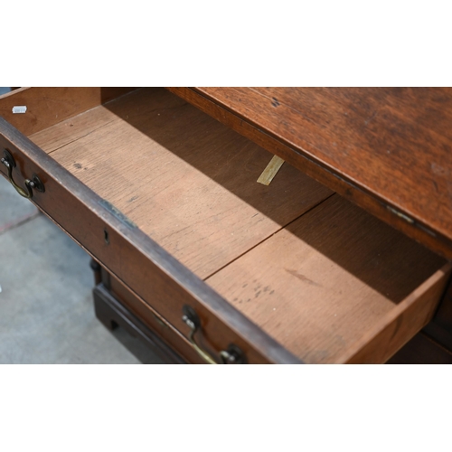 80 - A 19th century mahogany fall-front bureau with fitted interior over four long graduating drawers rai... 