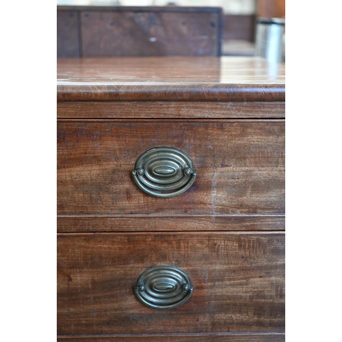 81 - A 19th century mahogany chest of four long graduating drawers with brass handles raised on bracket f... 