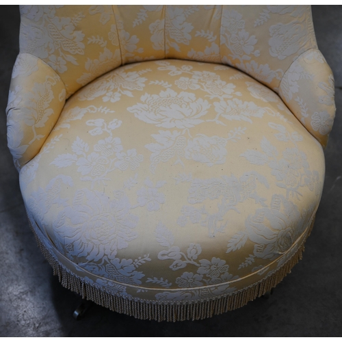 84 - A Victorian walnut framed nursing chair upholstered in yellow floral button back fabric, turned fron... 