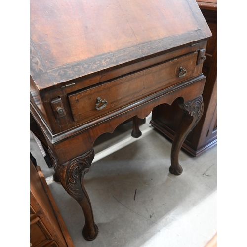 88 - A mahogany pen-work decorated bureau on stand with carved cabriole supports, 60 cm w x 42 cm d x 94 ... 