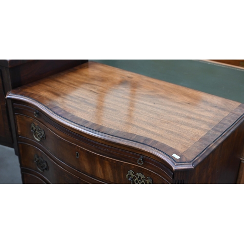 92 - A good quality Georgian style cross-banded mahogany serpentine front chest with brushing slide over ... 