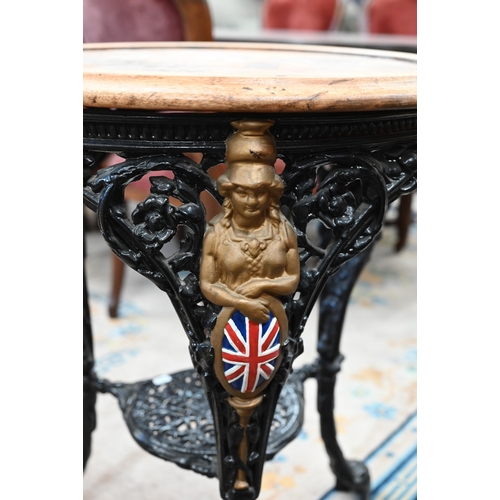 93 - A Victorian black and gilt (re-painted) cast iron Britannia table with later circular hardwood top, ... 