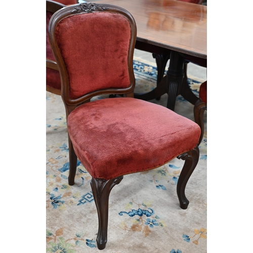 95 - A set of six Victorian floral carved mahogany dining chairs upholstered with burgundy velour fabric ... 