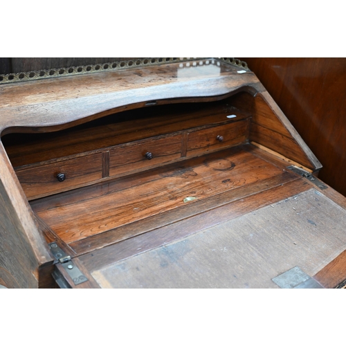 98 - A Continental early 20th century bureau with floral marquetry decoration and slender cabriole suppor... 