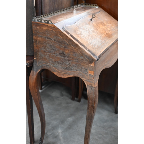 98 - A Continental early 20th century bureau with floral marquetry decoration and slender cabriole suppor... 