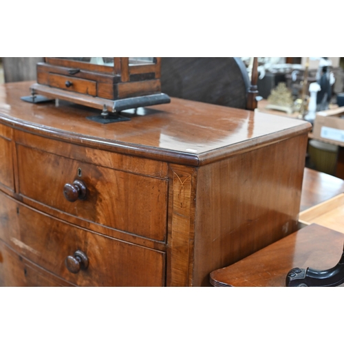 99 - A Victorian mahogany bowfront chest of two short over three long graduating drawers with turned hand... 