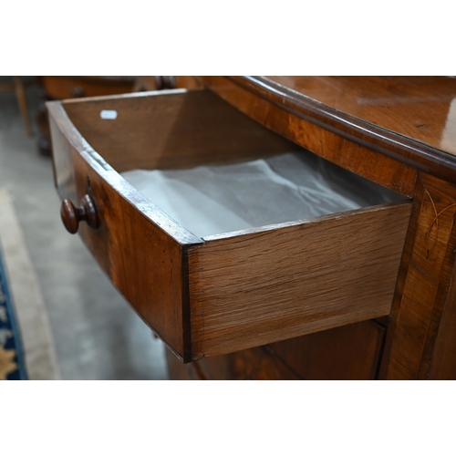 99 - A Victorian mahogany bowfront chest of two short over three long graduating drawers with turned hand... 