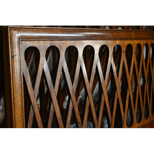 557 - A pair of antique lattice formed single bed frames, with iron side rails, both bear Heal & Son i... 