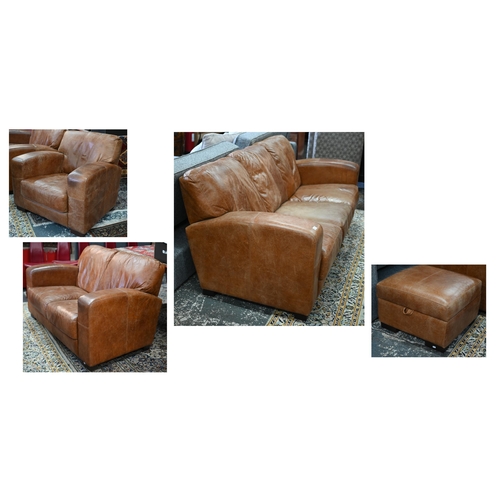 560 - A modern antiqued tan leather three seater sofa to/with a matching two seat sofa, an armchair and ot... 