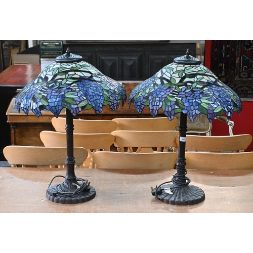 561 - A large pair of Tiffany-style lamps with stained glass 'wisteria', shades, 74cm high