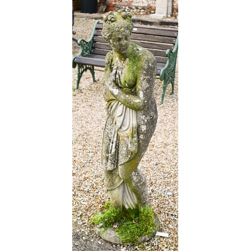 10 - A weathered cast stone statue of a classical female figure, 117 x 38 cm