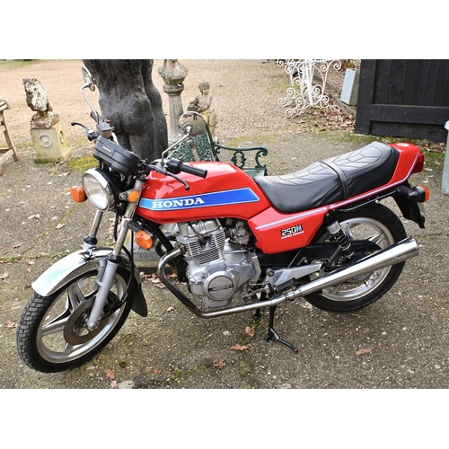 25 - A modern classic Honda 250N Super Dream motorcycle, 1982, reg. DGK 968X, red/chrome, showing 43,214 ... 