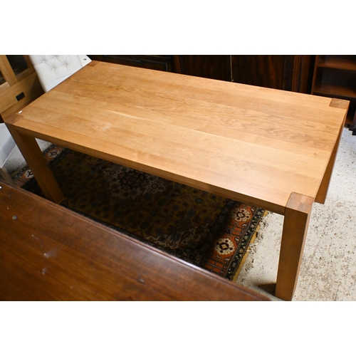 39 - A contemporary oak dining table, raised on square corner legs 180 cm w x 90 cm d x 77 cm h