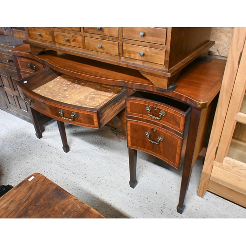 48 - A George III cross-banded bowfront satinwood sideboard, centred by a drawer flanked by a twin dummy ... 