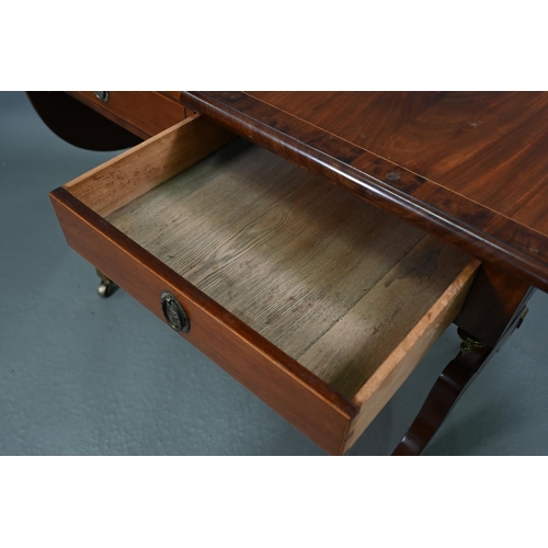 102 - A Regency cross-banded satinwood sofa table, the drop leaf top over two frieze drawers and opposing ... 