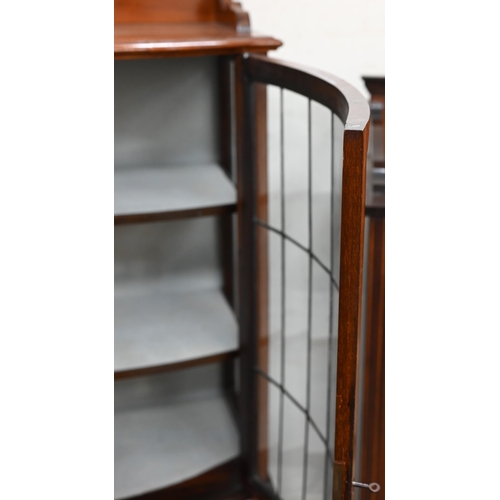 146 - An Edwardian walnut bowfront display cabinet with lead-glazed door, 64 cm w x 40 cm d x 174 cm h