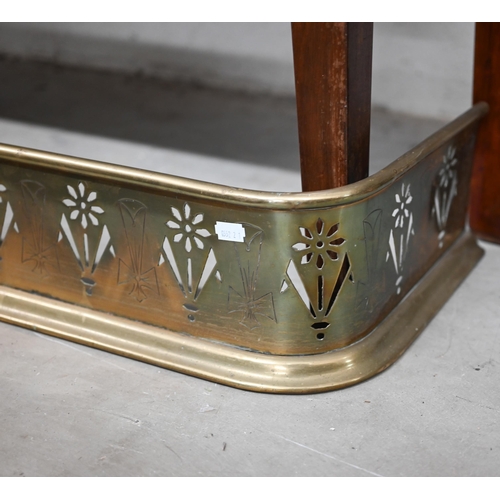 162 - An early 20th century brass fender pierced with floral motif alternating with engraved cross of St P... 