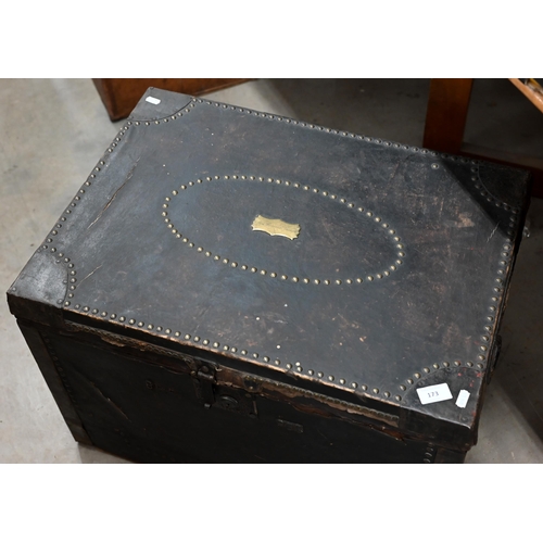 173 - An early/mid 19th century pine trunk covered in brass studded leather with side handles and ownershi... 