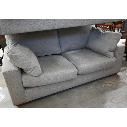 208 - A pair of contemporary Marks and Spencers box arm 'Geneva Special' medium two-seater sofas (2018) up... 