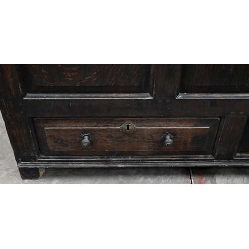 232 - An antique panelled oak mule chest with hinged top and two drawers, 148 x 60 x 88 cm h