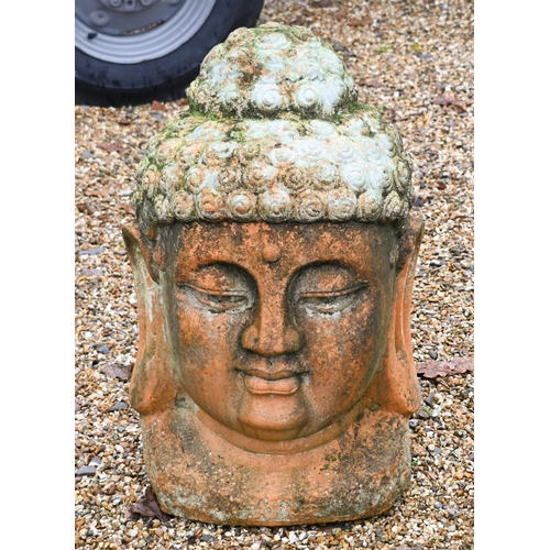 1 - A large weathered terracotta Buddha head garden feature, 70 cm h