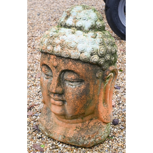 1 - A large weathered terracotta Buddha head garden feature, 70 cm h