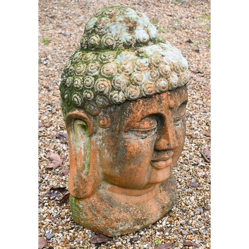 1 - A large weathered terracotta Buddha head garden feature, 70 cm h