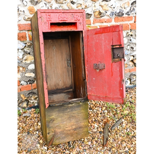 10 - A cast iron 'ER' branded mail box, wooden back, a/f