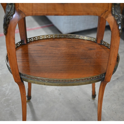 100 - An early 20th century French kingwood and floral marquetry two-tier side table with gilt metal mount... 