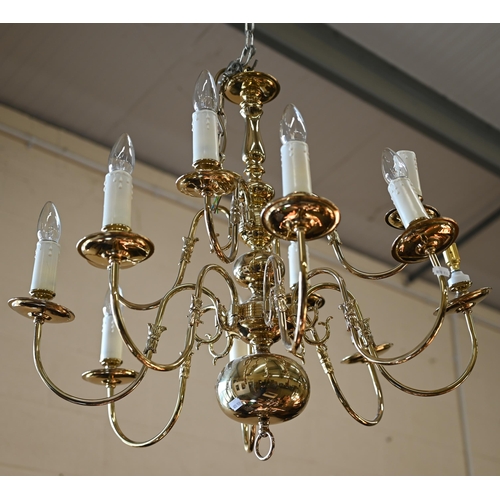 105 - A Dutch style double tier twelve branch brass electrolier, approx. 60 cm drop