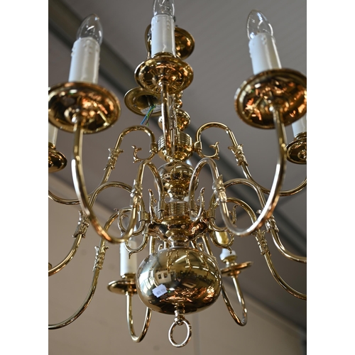 105 - A Dutch style double tier twelve branch brass electrolier, approx. 60 cm drop