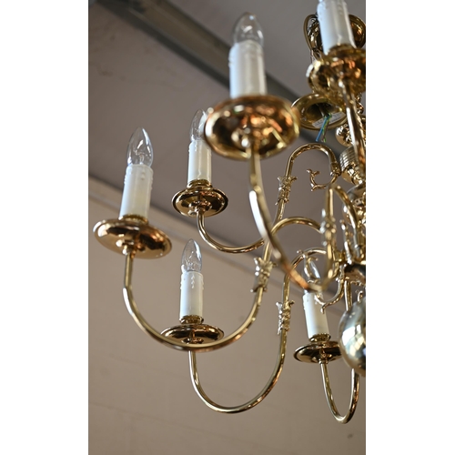 105 - A Dutch style double tier twelve branch brass electrolier, approx. 60 cm drop