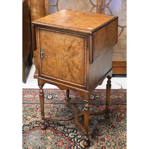 119 - A Waring & Gillow Ltd 20th century walnut drop leaf bedside cabinet on turned supports and stret... 