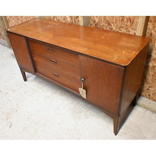 138 - A mid-century teak 'Austin Suite' sideboard with three central drawers flanked by cupboard doors (a/... 