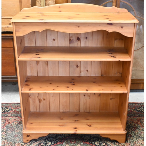 145 - A pair of pine five drawer tall boy chests with turned handles, 60 x 42 x 120 cm high to/w pine open... 