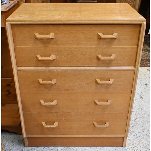 148 - A mid century light oak G Plan Brandon chest of five long graduated drawers, 76 x 45 x 98 cm high