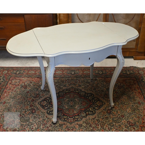 150 - A French painted drop leaf table to/w folding cane seated bidet stool in matching paint finish (2)