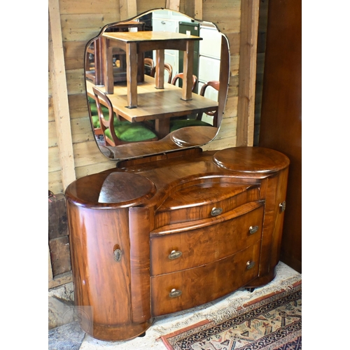 155 - A Shrager Art Deco walnut veneer dressing chest with cloud-shaped mirror over an arrangement of draw... 