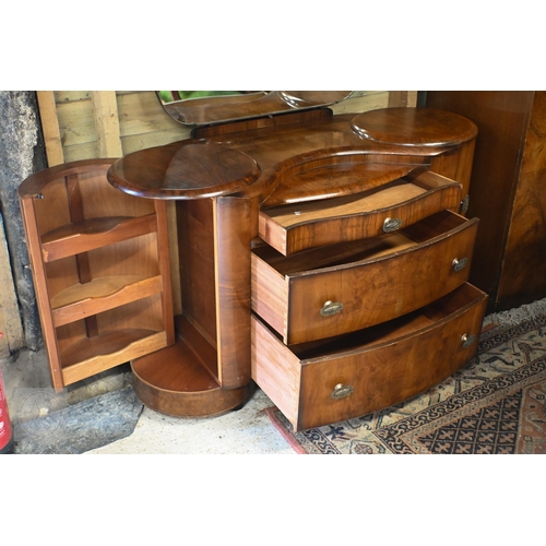 155 - A Shrager Art Deco walnut veneer dressing chest with cloud-shaped mirror over an arrangement of draw... 