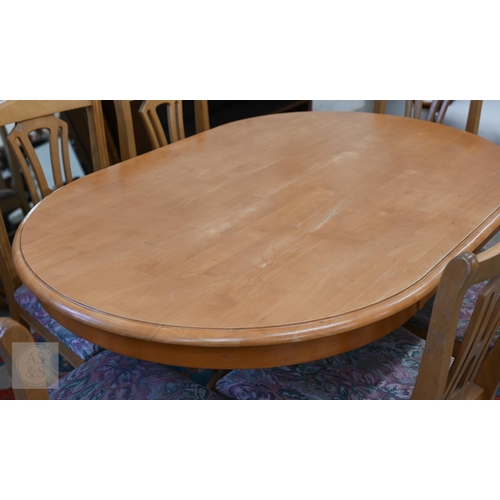 158 - A modern beech oval dining table on turned column and quadra base, 134 x 90 x 76 cm high to/w set of... 