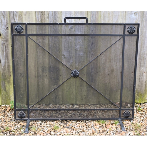 16 - A large steel and wire mesh spark guard to/w a wrought iron stick stand (2)