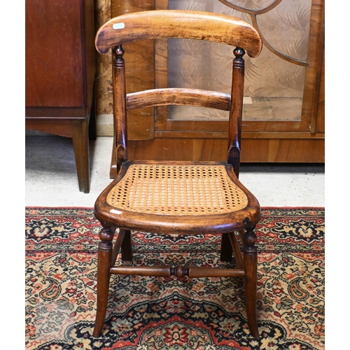 160 - An antique stained beech cane seated child's chair to/w three division Canterbury a/f (2)